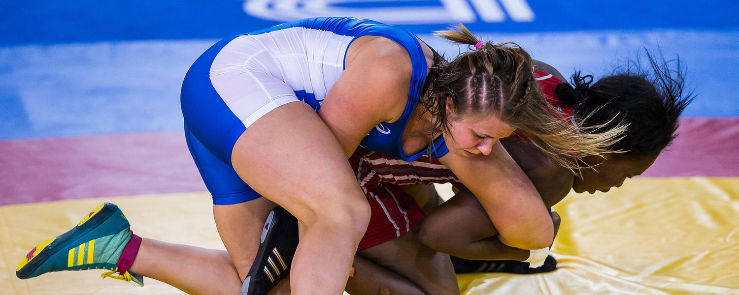 image of Erica Weibe wrestling for the high performance athletics theme