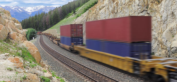 image of a train carrying cargo
