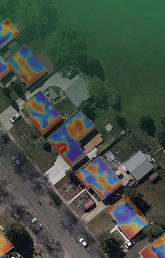 aerial view showing internal heat of homes
