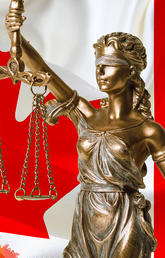 Lady Justice in front of a Canadian flag