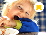 image of kid eating and making a mess