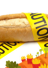 A loaf of bread wrapped in caution tape